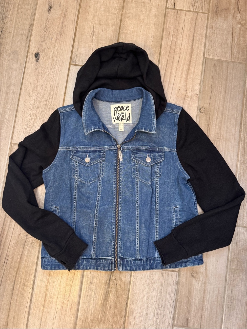 Peace Love World Blue Denim Jacket with Black Hoodie Sleeves
